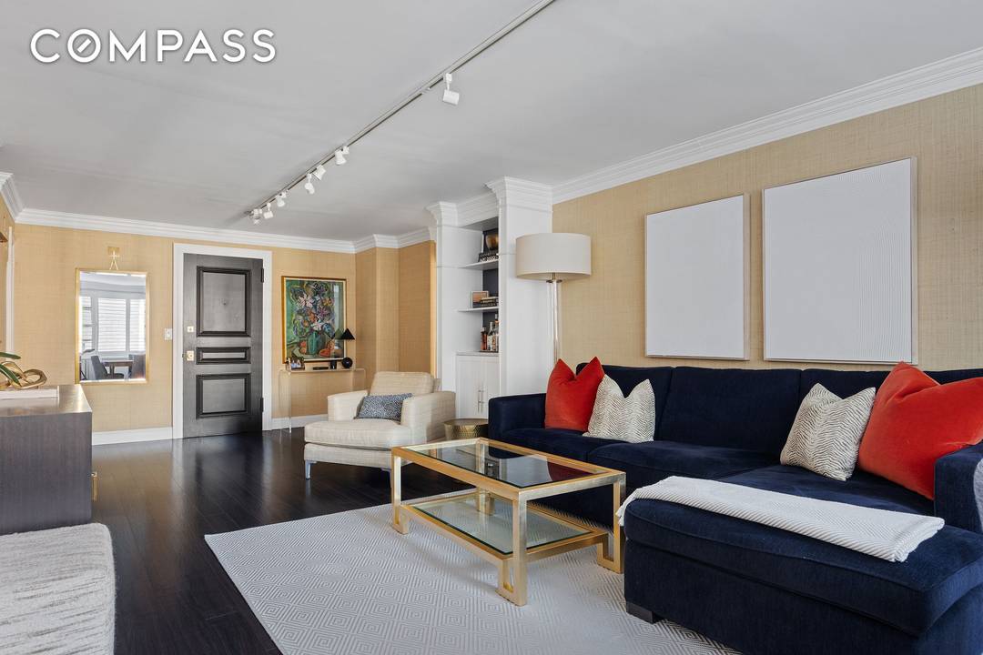 This tastefully renovated and beautifully appointed two bedroom, one bath residence is perched high on the ninth floor of 196 East 75th Street, a white glove cooperative in the heart ...