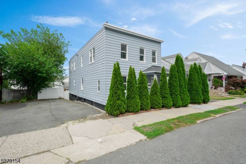 This prime opportunity on a quiet street offers two spacious units, each with renovated eat in kitchens, modern stainless steel appliances, and central air conditioning.