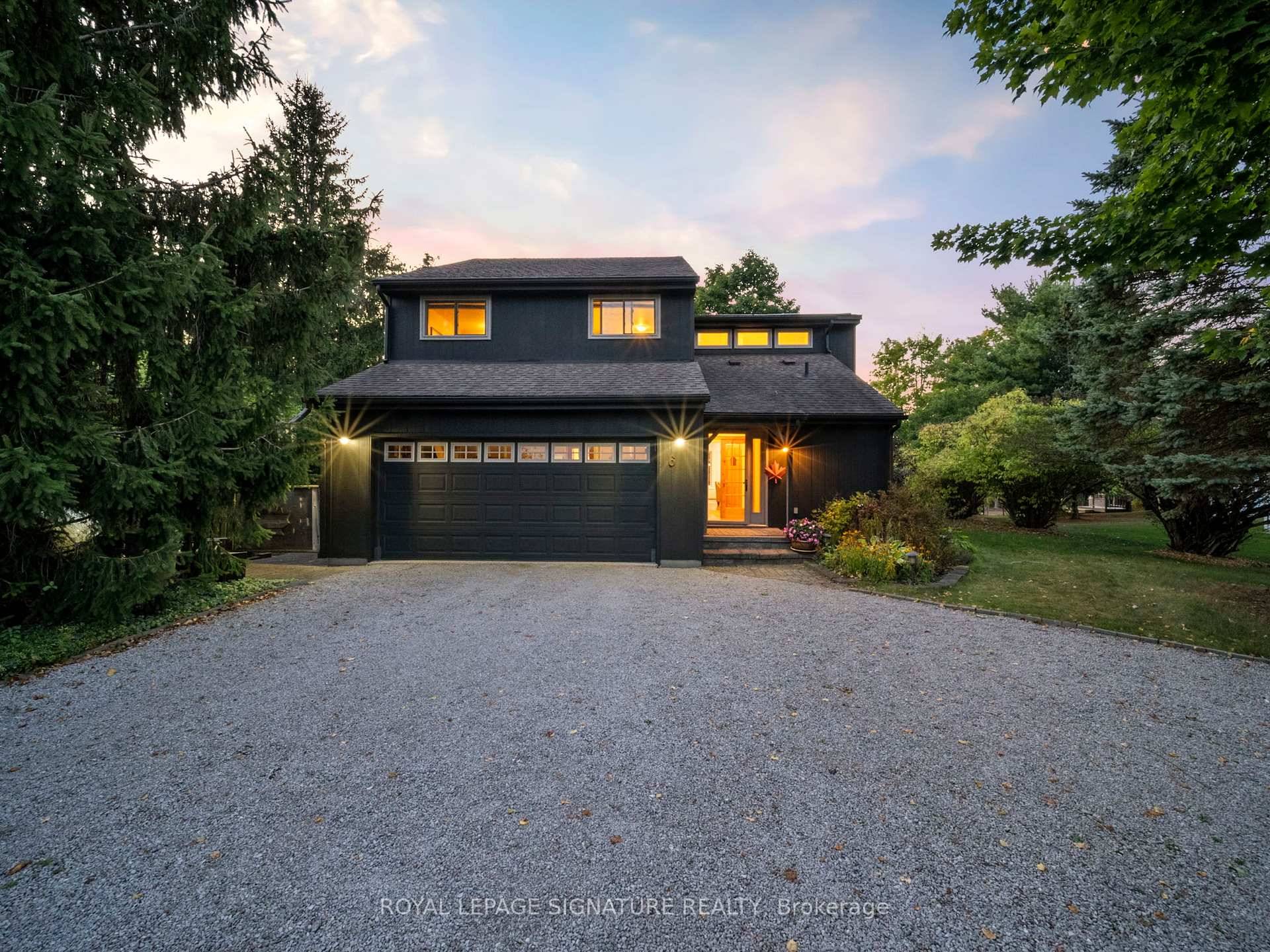 Welcome to your dream retreat at 6 Petherwin Place, nestled on the serene shores of Bass Lake !