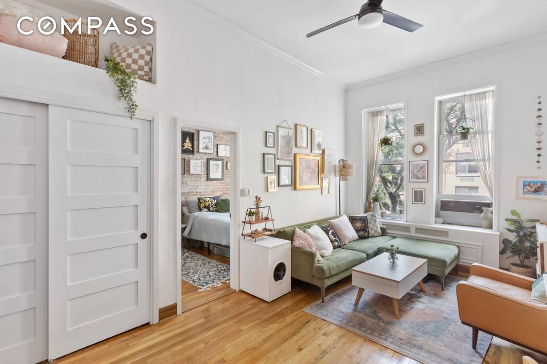 Soaring ceilings and exquisite details welcome you into this charming home just minutes from Central Park !