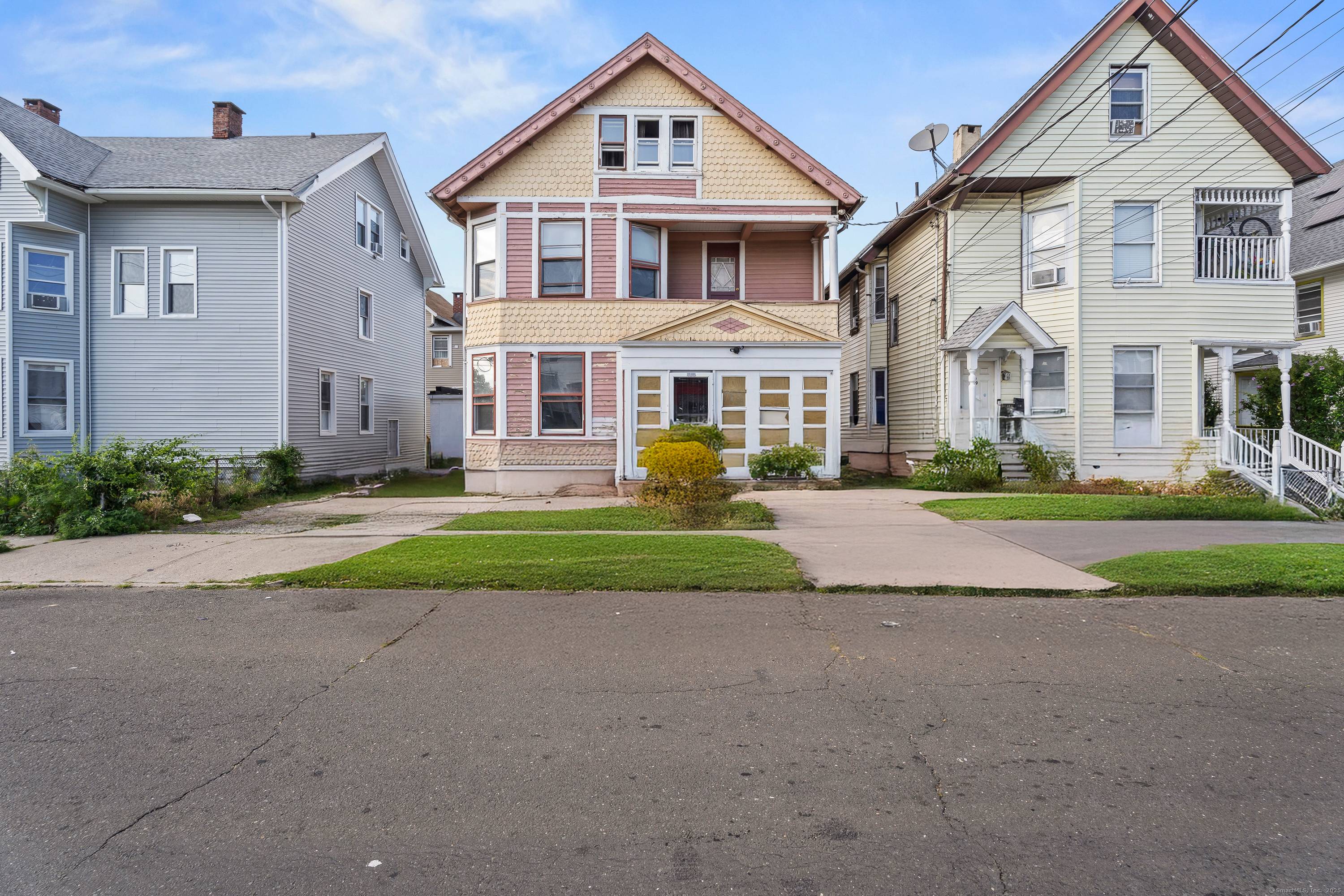 Welcome to 295 Shelton Street, a well positioned 3 family property featuring three spacious 2 bedroom, 1 bath units.