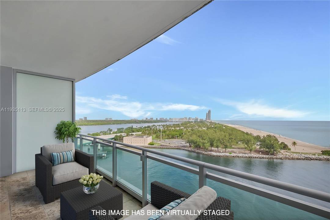 Oceanfront and Bay views from this spacious three bedroom.