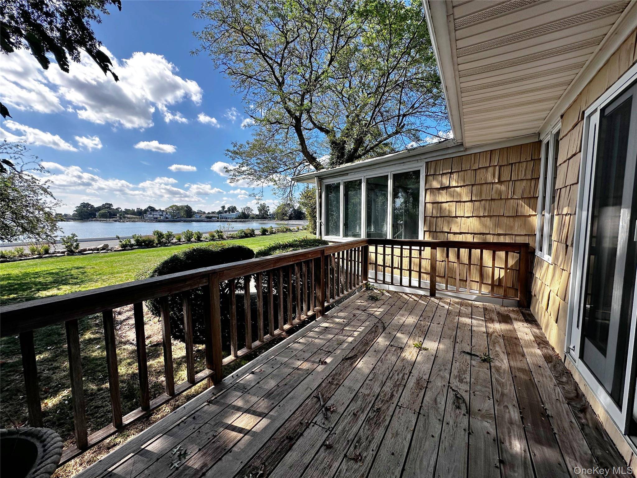 Resort style living awaits on a peaceful Orienta cul de sac, where panoramic 180 degree water views of the Long Island Sound, bridges, and Delancy Cove create an extraordinary backdrop ...