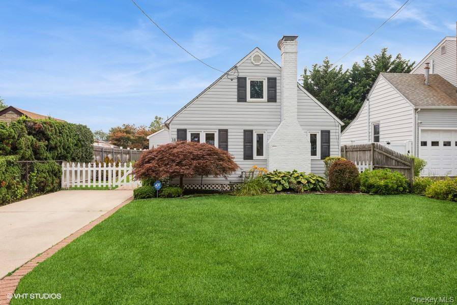 Lovely single family Cape Cod in the Frederick Shores section that boasts its own Private Beach !