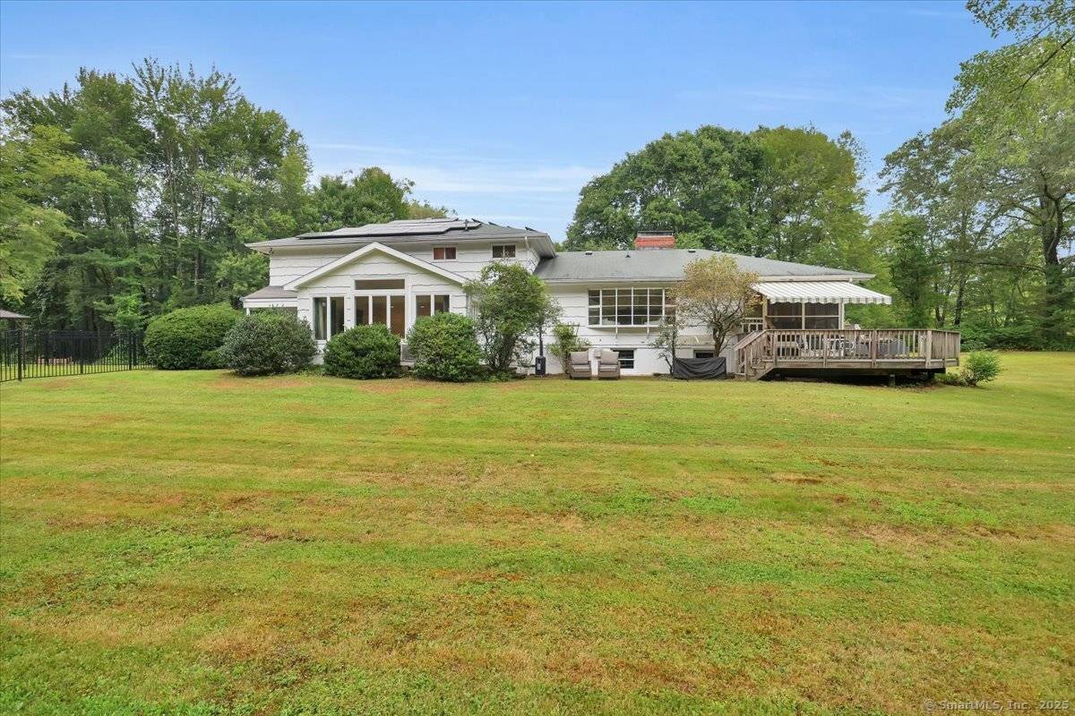 Tucked away in a serene, private pondside setting, yet just minutes away from shopping and schools, this beautifully preserved mid century home offers a unique blend of timeless design and ...