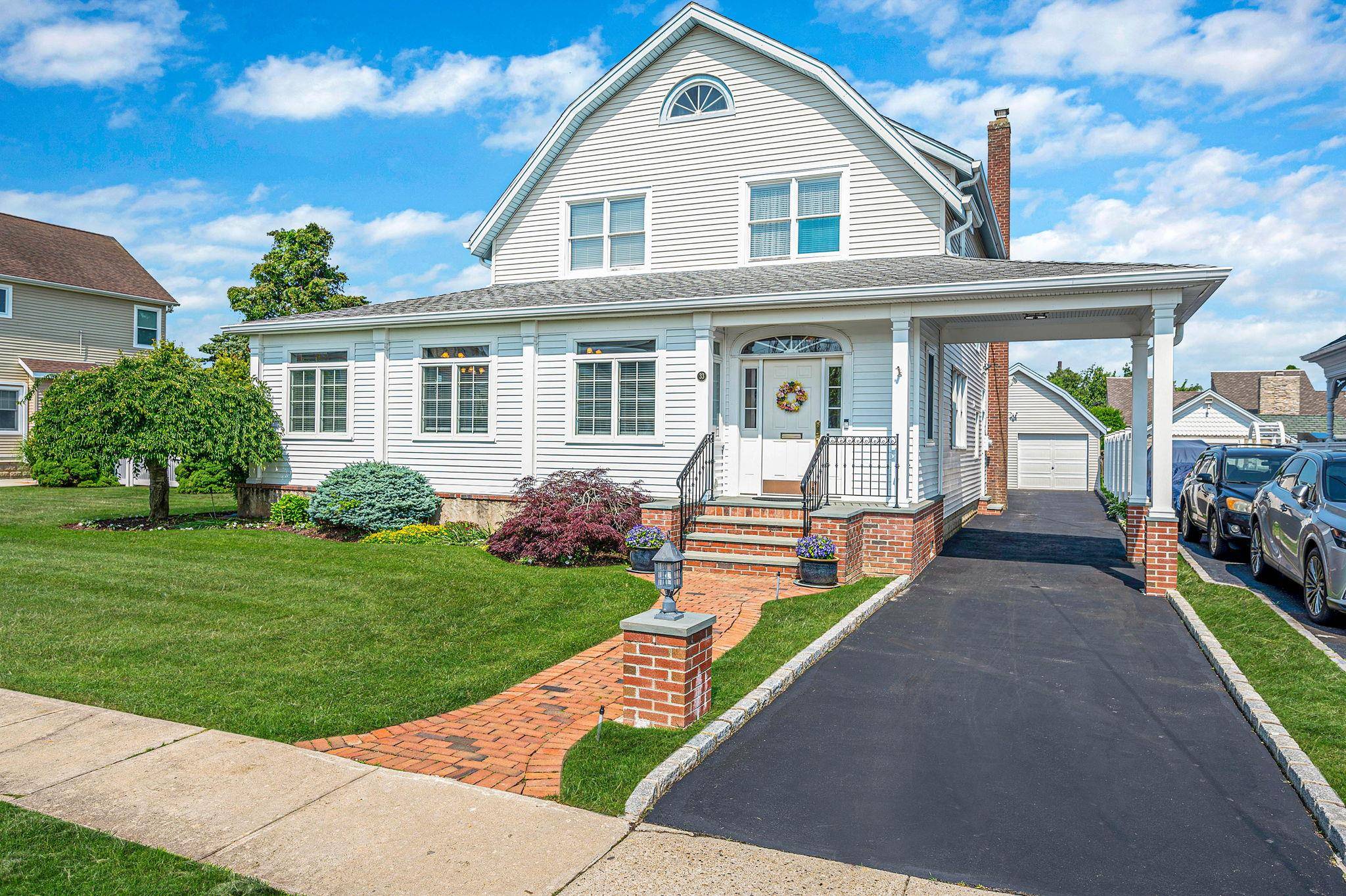 Welcome to 33 South Bay Avenue a beautifully maintained 4 bedroom, 2 bathroom waterfront home that blends historic character with modern upgrades, set on a quiet, tree lined street just ...