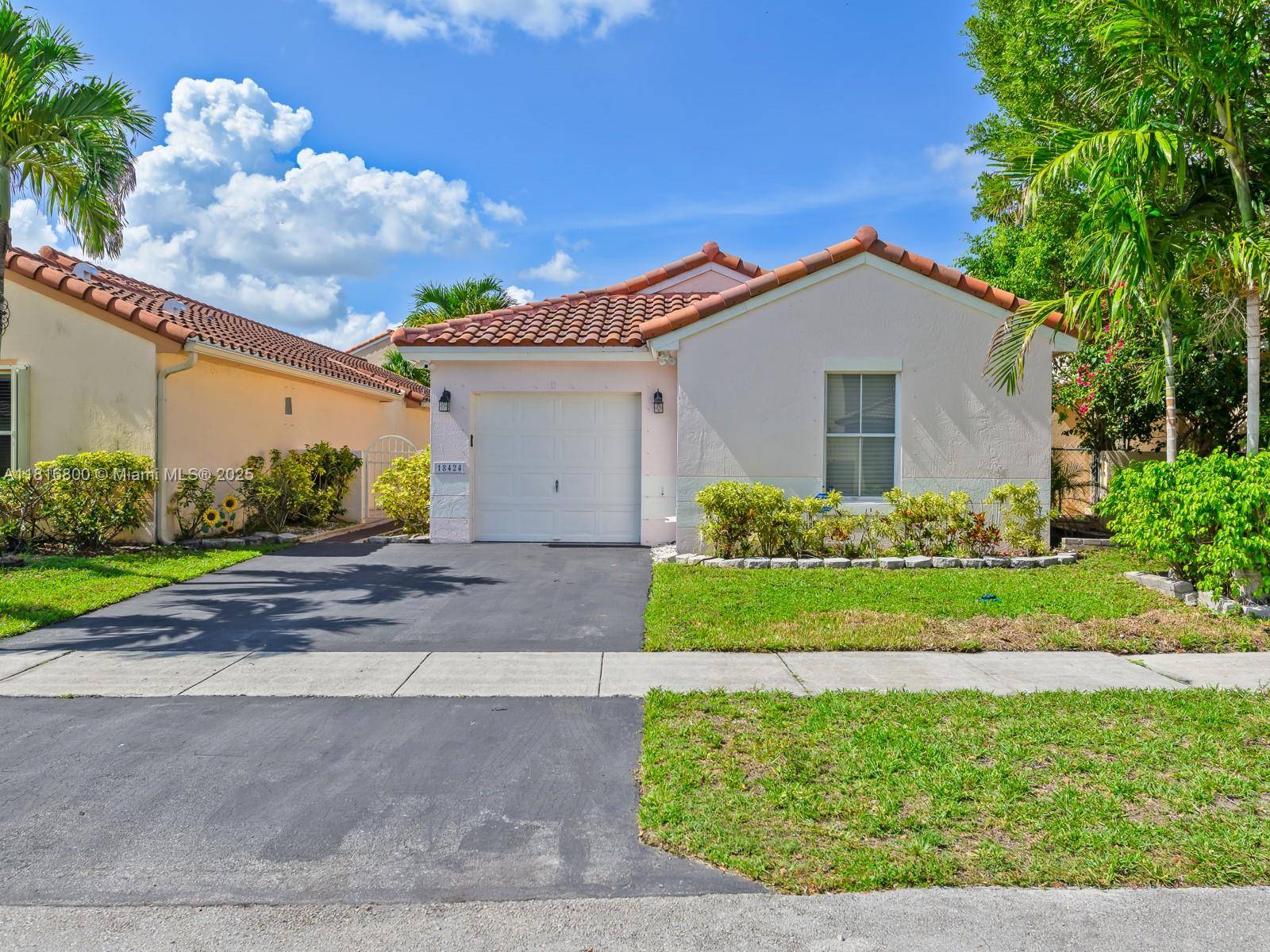 This 3 bedroom 2 bathrooms home features new roof in 2022, new laminated flooring throughout, new bathrooms vanities that were redone two years ago vaulted ceilings.