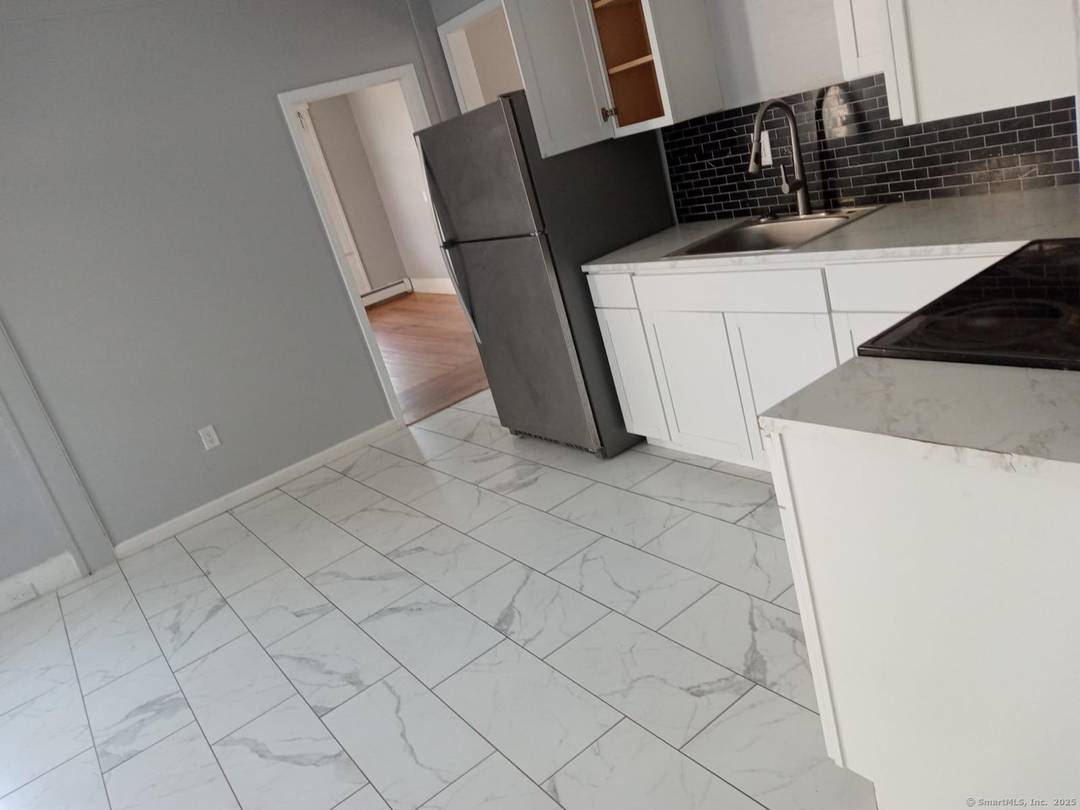 Welcome to 33 Chapel ! This property has a three bedroom apartment on the first floor and also a three bedroom apartment on the second floor, additionally it has the ...