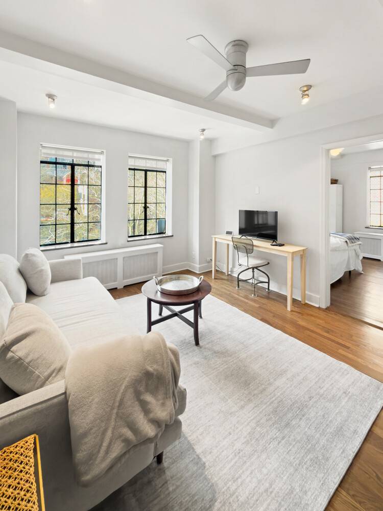 Renovated Corner 1 Bed in Tudor City with Landmark Views of the Chrysler Building !