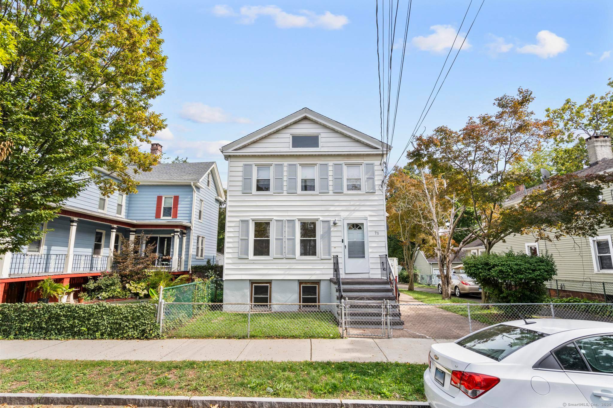 This spacious property features 5 bedrooms and 2 full bathrooms across two updated units, each with its own private deck overlooking the backyard.