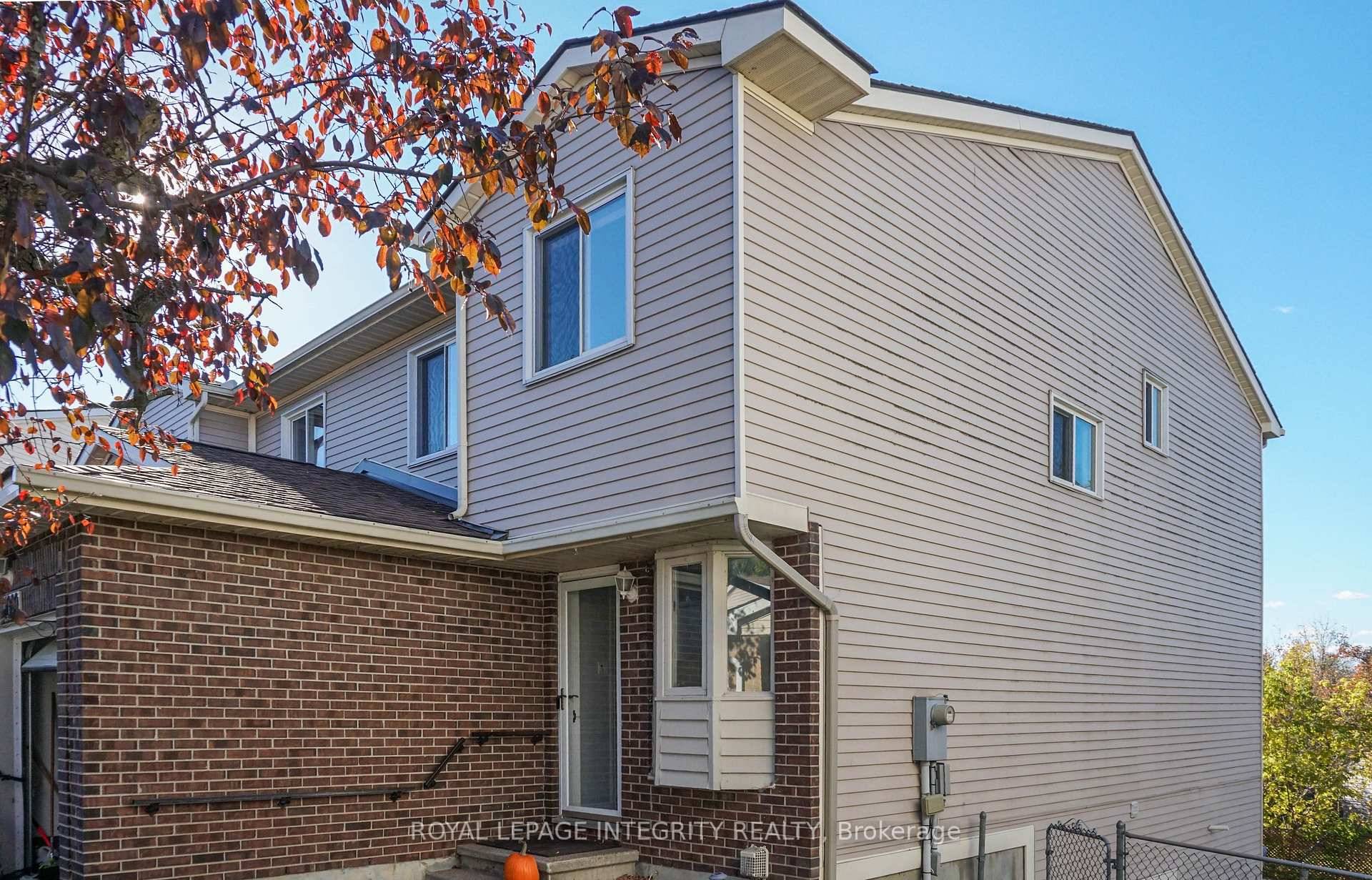 Welcome to this beautifully updated 3 bedroom Den, 4 bathroom semi detached home !