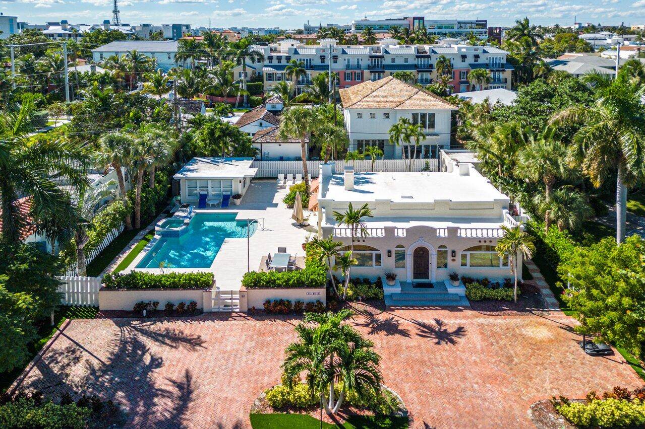 Welcome to Casa Marina a 4 bedroom 4 bath compound on a sprawling double lot in the heart of Downtown Delray Beach.