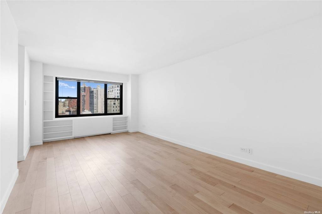 This large fully renovated 1bd, 1 bath on the 18 floor, corner UES unit is a perfect place to call home or for investmentTwo XL closeted foyer leads into the ...