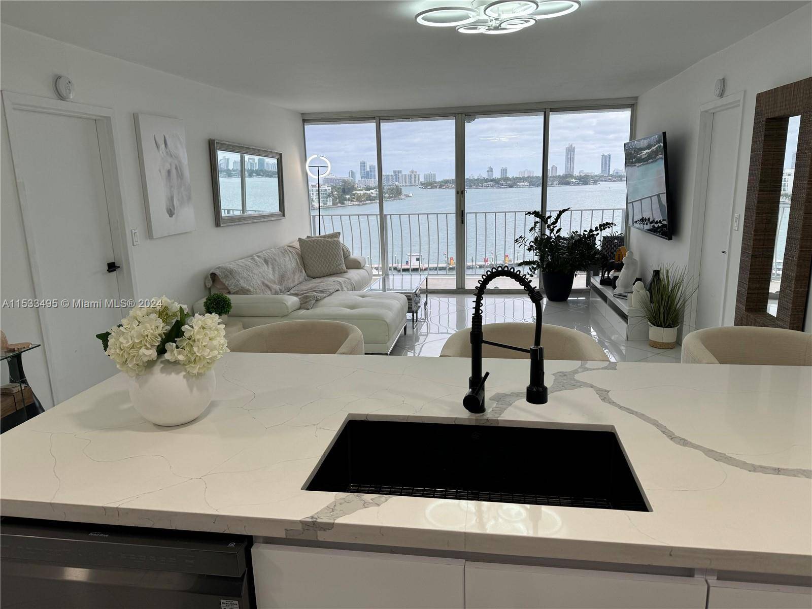 Discover waterfront living at its finest in North Bay Village with this stunning two bedroom, two full bath unit, boasting a complete remodel.