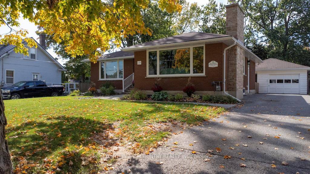 Welcome ! This beautifully maintained custom brick bungalow offering timeless charm and modern comforts.