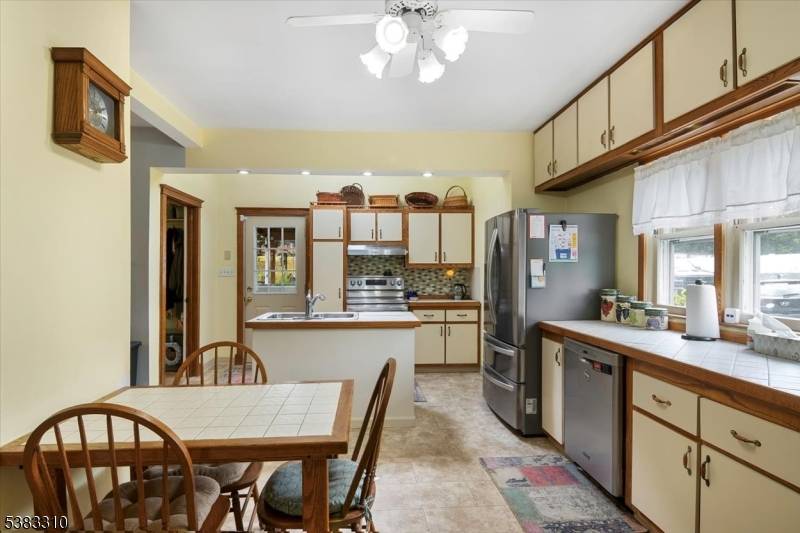 Charming Colonial with Endless Potential on a Subdivided, Buildable Double Lot !