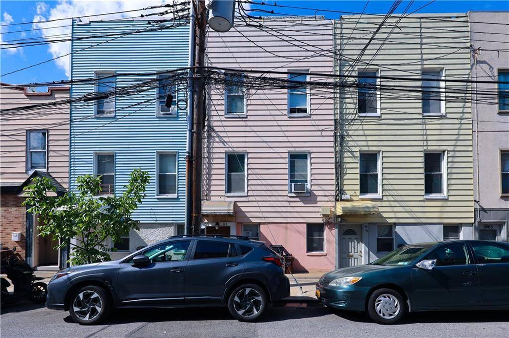 Welcome to this well maintained attached 3 family home in Maspeth.