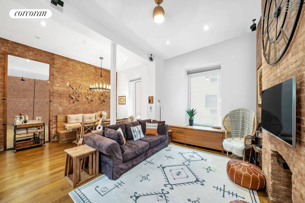 Welcome to 23 East 10th Street 204 205, an impeccably renovated, seamlessly combined 3 bedroom, 2 bathroom home with an additional home office and sleeping loft in the heart of ...