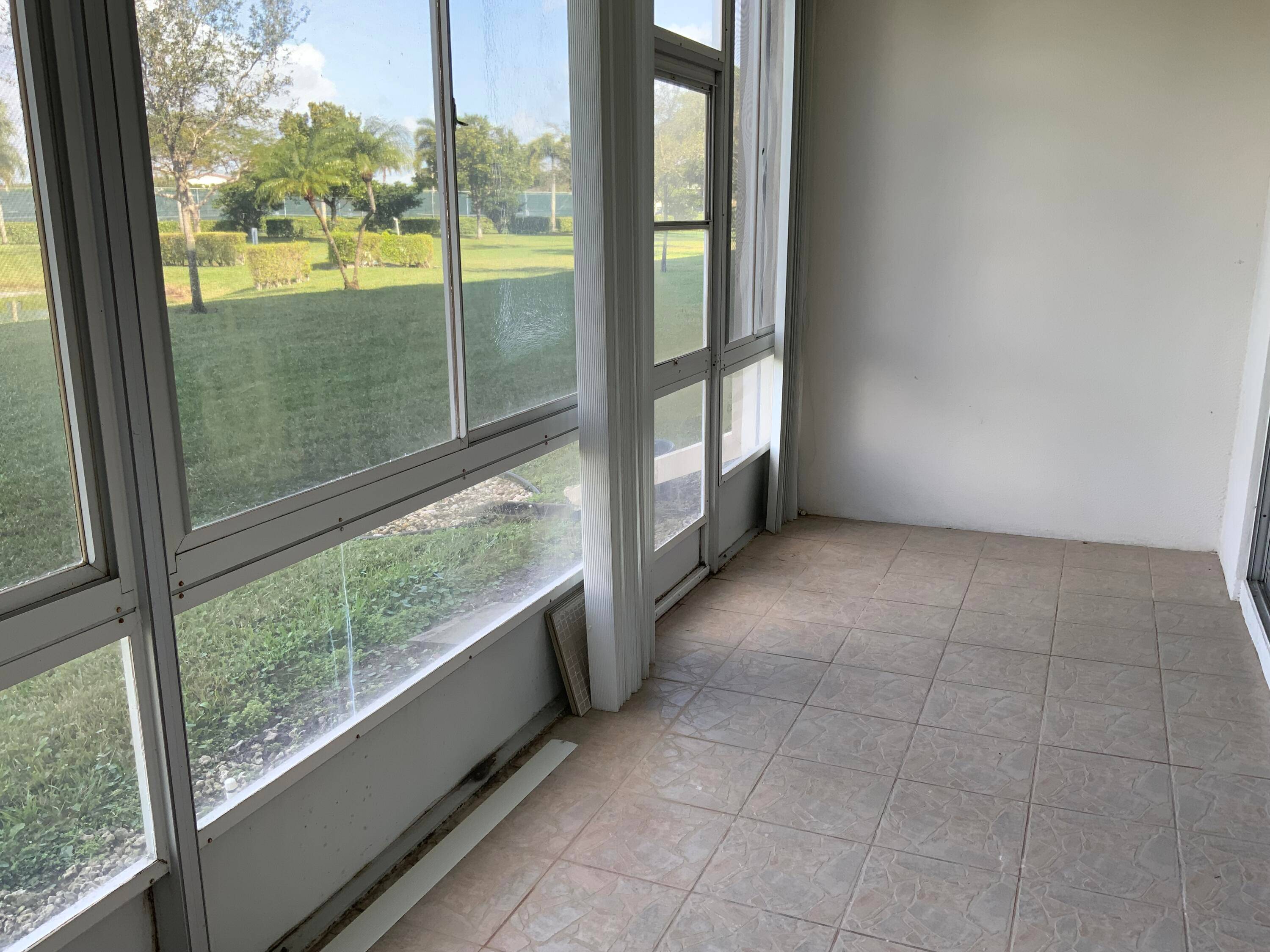 . Beautiful ground floor corner with parking right near front door.