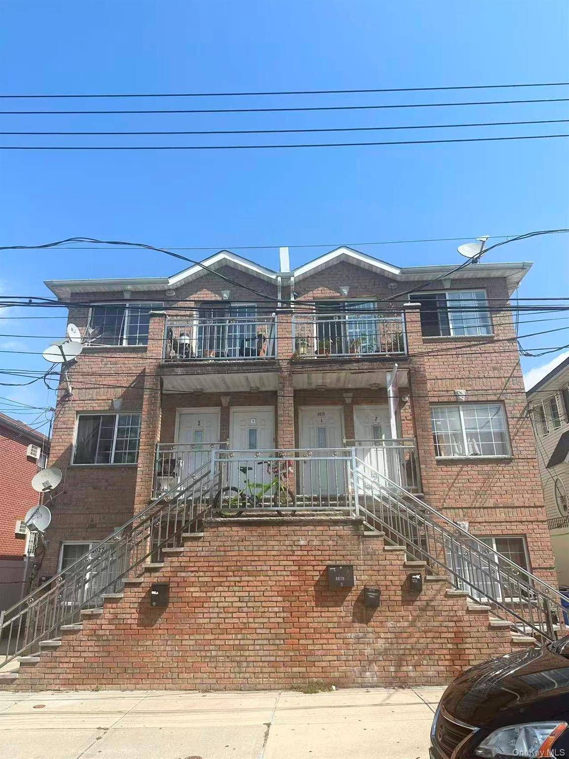 Charming well maintained 3 family home in Glendale.