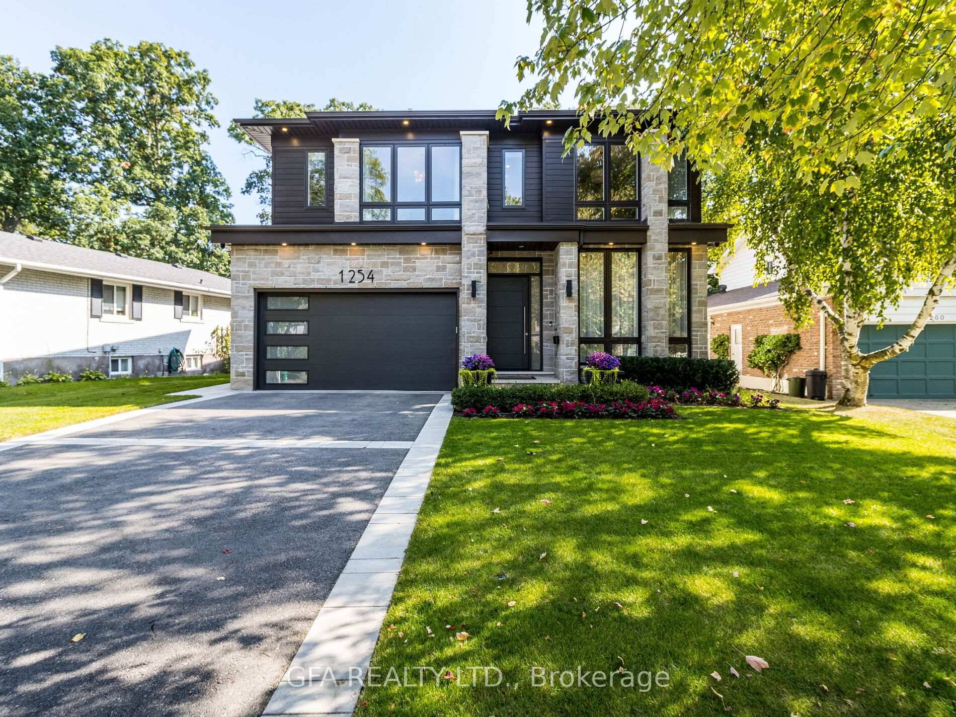 Situated in the heart of Lorne Park, this exceptional custom built home by Eaglecrest Homes offers an unparalleled combination of elegance, privacy, and modern design.