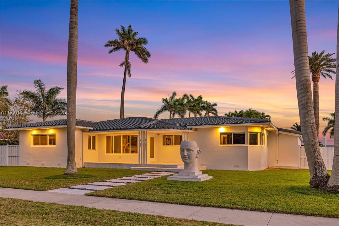 Experience luxury living in this stunning modern contemporary home, perfectly situated on a coveted corner double lot just minutes from Hollywood Beach.