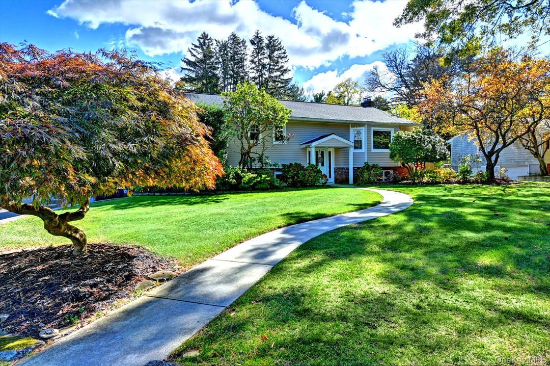 HOME FOR THE HOLIDAYS ! This beautifully up dated High Ranch home has many new features and is ready for its next family !