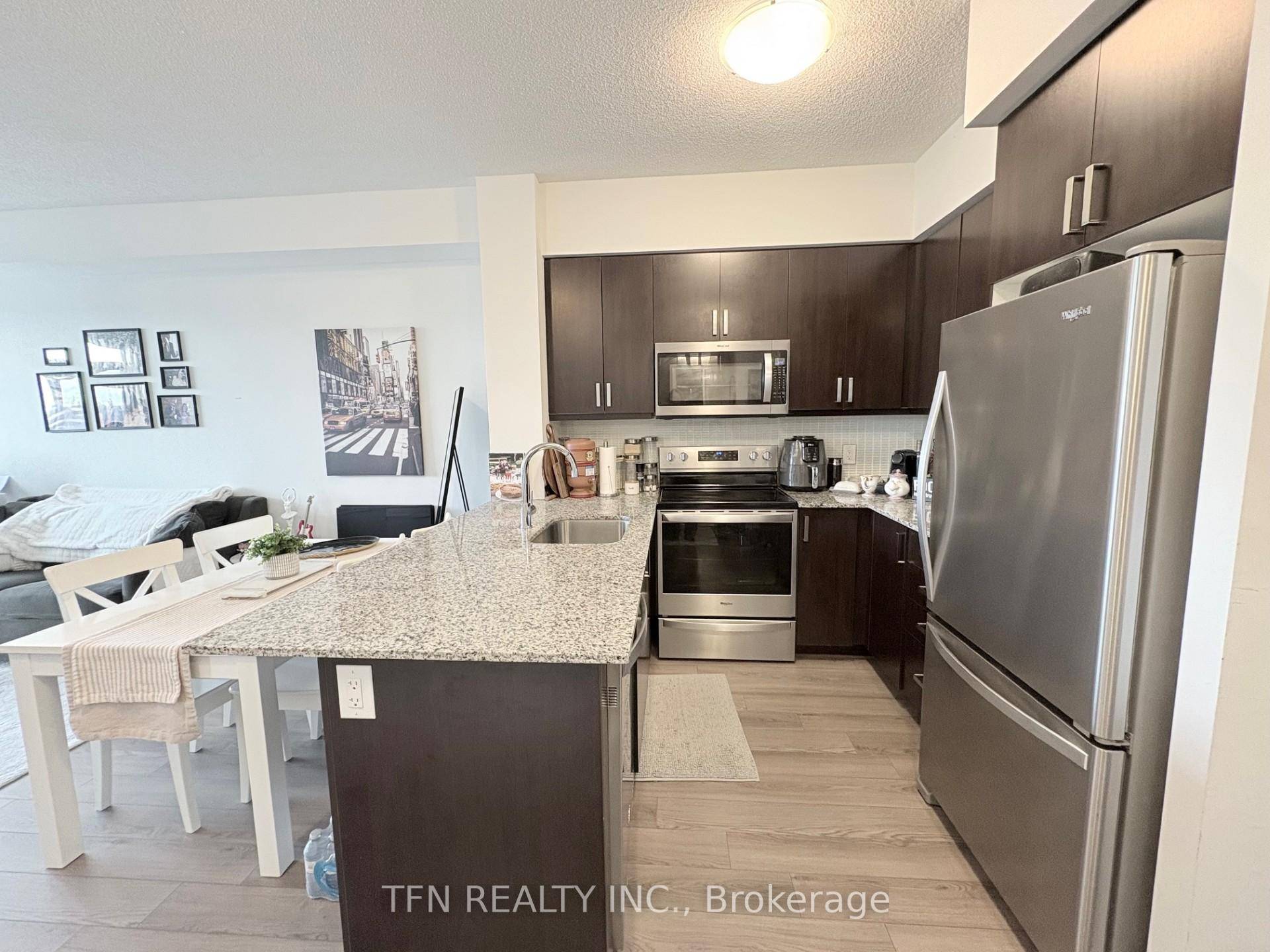 This Spacious 1 Bedroom Unit Is Beautifully Appointed With Over 16, 000 in Upgrades such as Laminate Floors Throughout, Full Size Washer Dryer, Frameless Glass Shower with Pot Light, Window ...