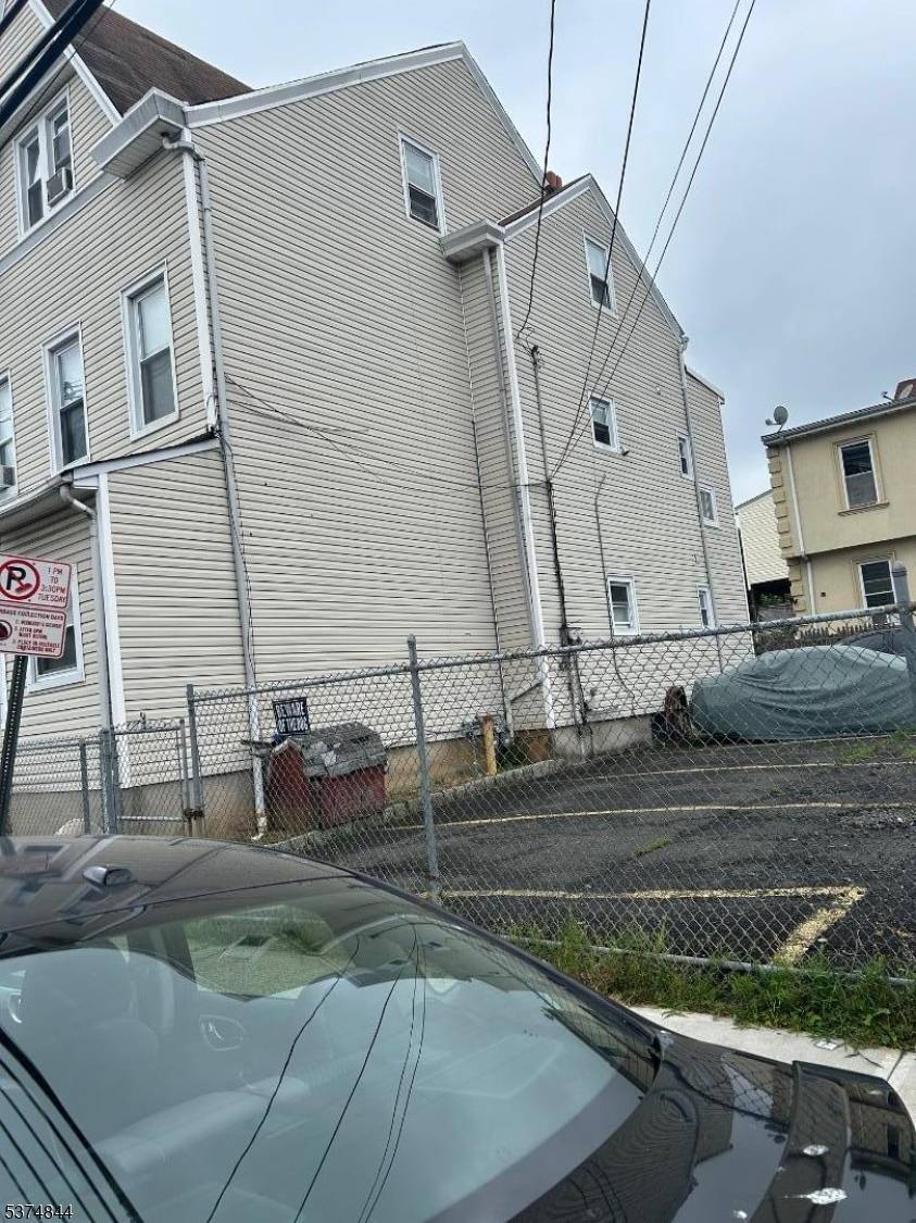 Great two family home, with bonus lot and parking for 5 cars !