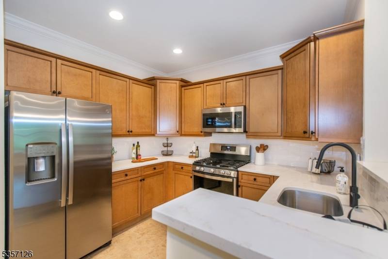 NEWLY RENOVATED, beautifully updated 2 bed, 2 bath offering of spacious living approx 1230 just under a mile from downtown Summit w GARAGE PARKING.