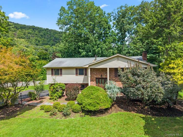 Welcome to this spacious larger Mayfair style high ranch, offering over 2, 300 square feet of living space, not including the two car garage.