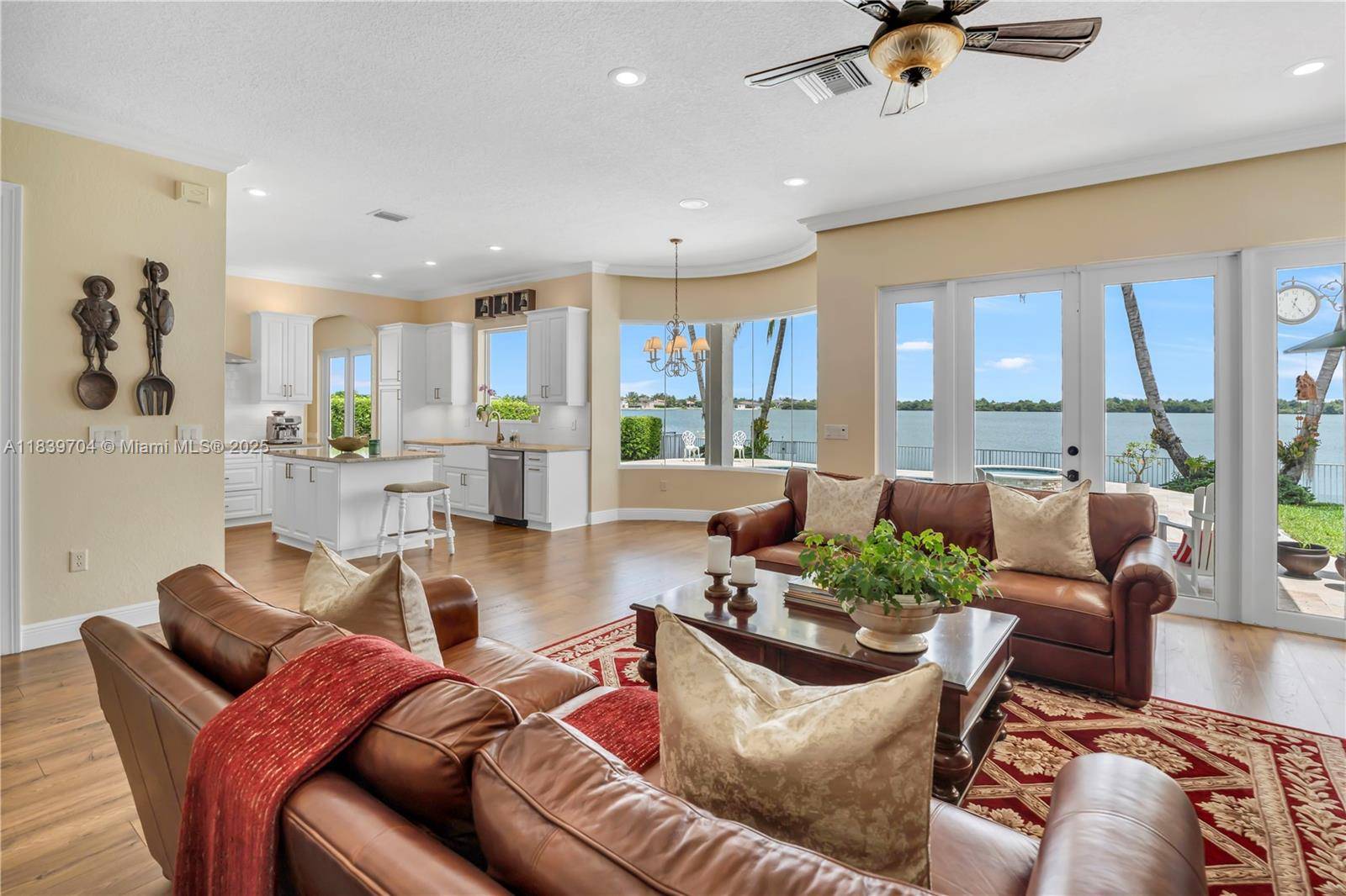 Welcome to your dream home in the prestigious, guard gated Sunset Lakes !