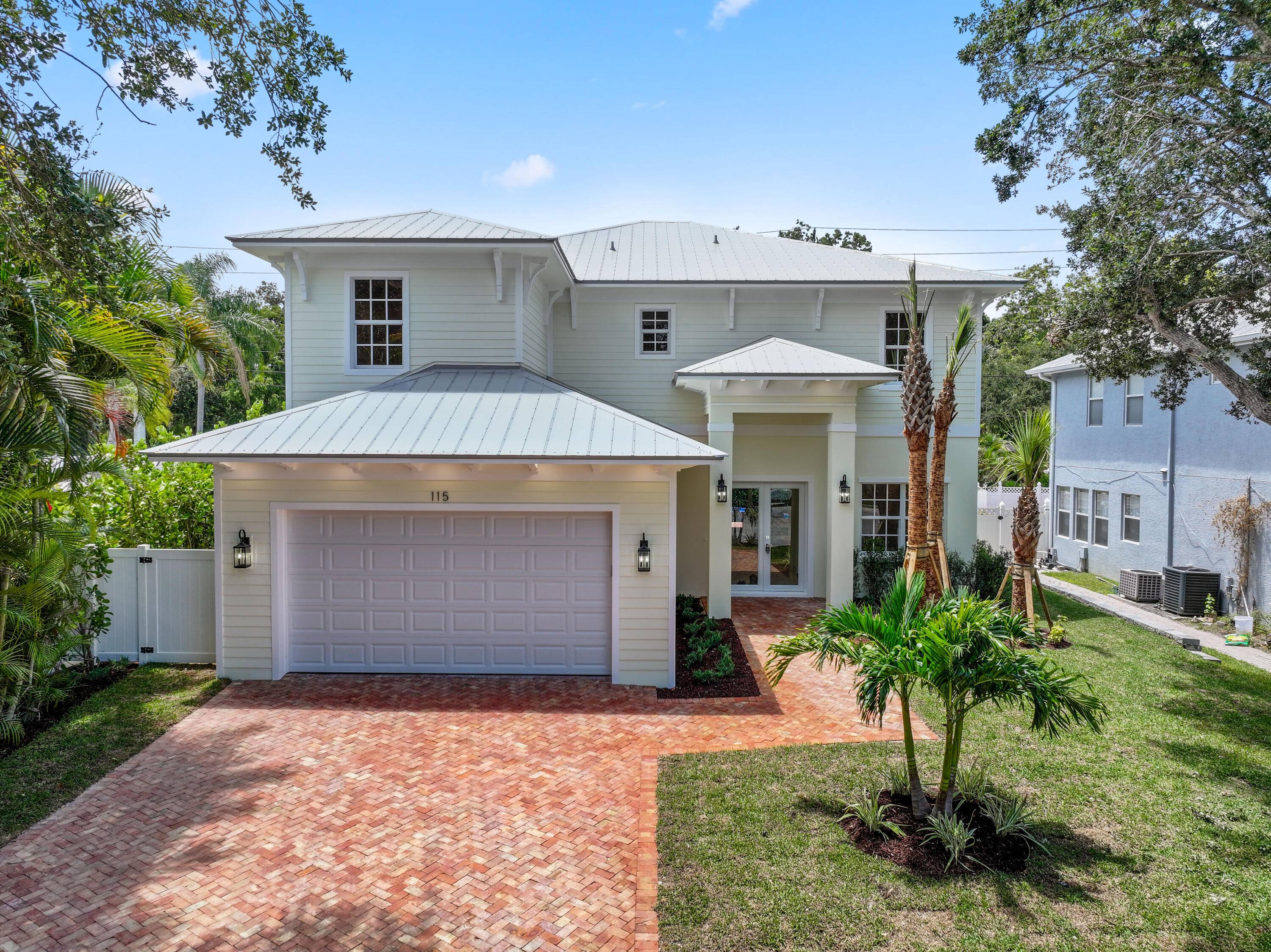 2025 Brand New Construction Two Story Pool Home in the gated community of the Estates of Sims Creek, in Jupiter, FL.