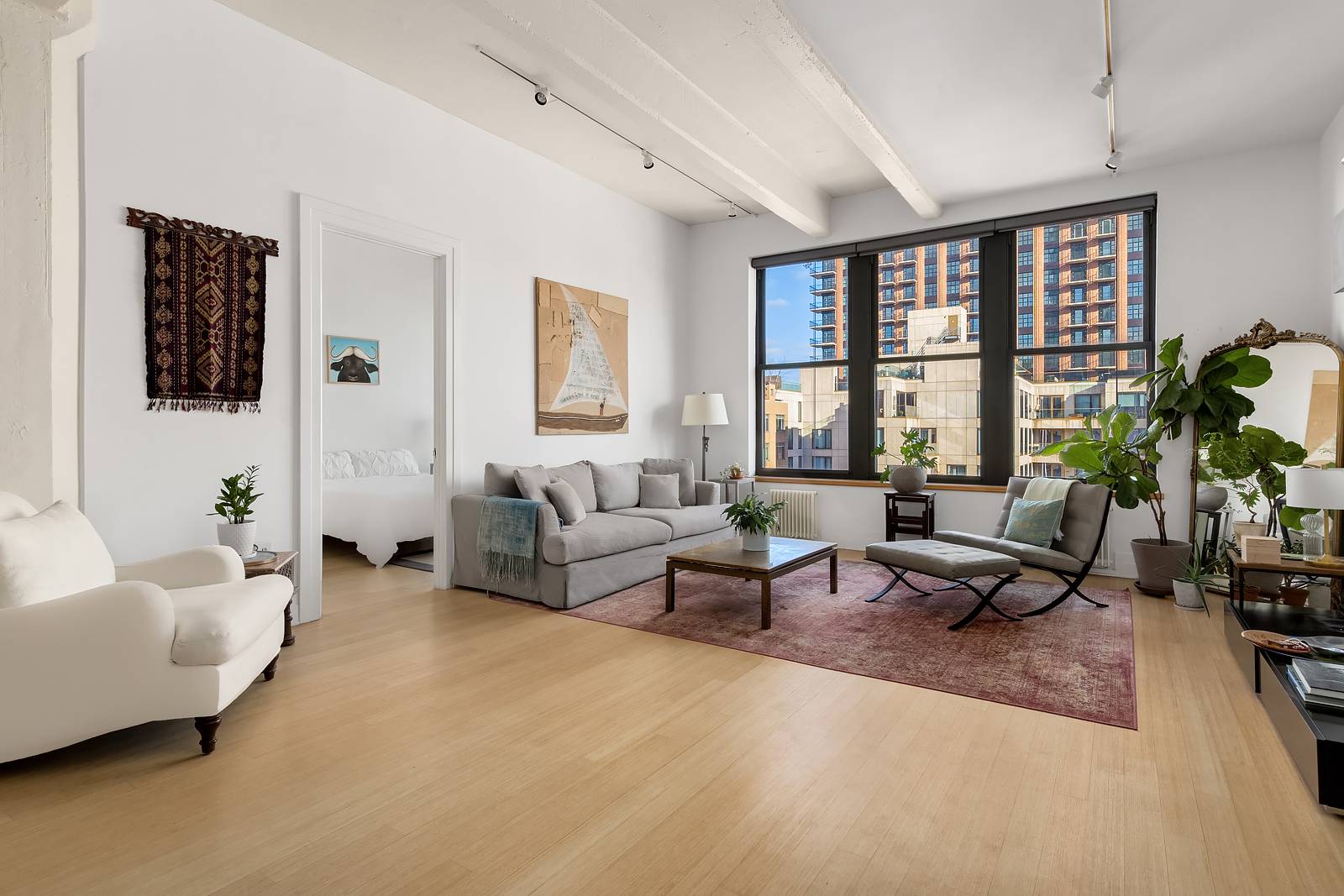 Sprawling sun splashed Modern LOFT One Bed plus home office interior bedroom in the heart of Prime DUMBO.