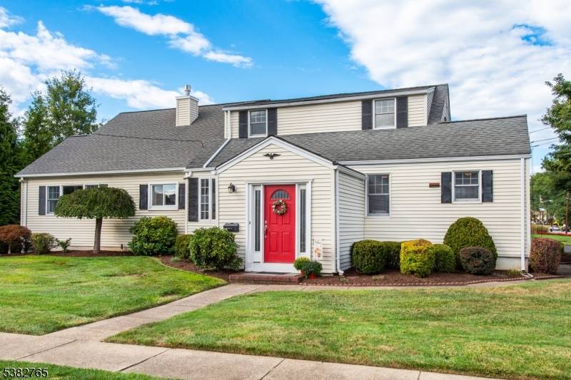 Discover this lovely expanded Cape Cod home that blends comfort, versatility, and convenience in a prime location.