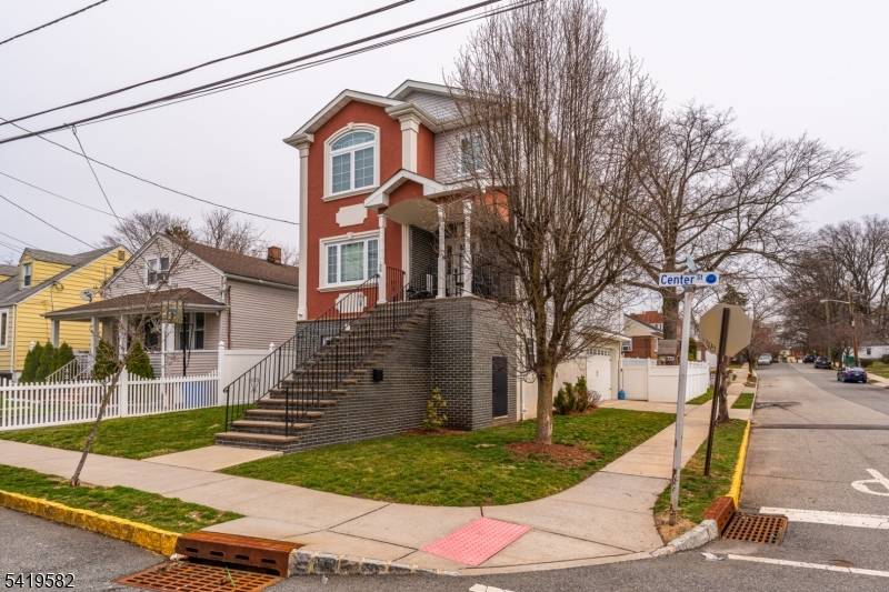 Beautiful single family home offering 4 bedrooms, 2 full bathrooms, and 2 half bath with a spacious and functional layout.