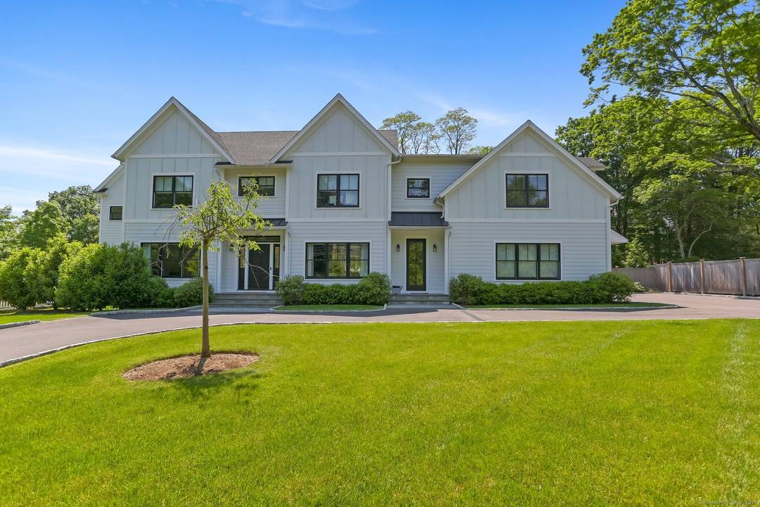 Majestically sited on 2 private acres of professionally landscaped grounds, this exceptional SMART modern farmhouse surpasses new construction standards with uncompromising attention to detail.