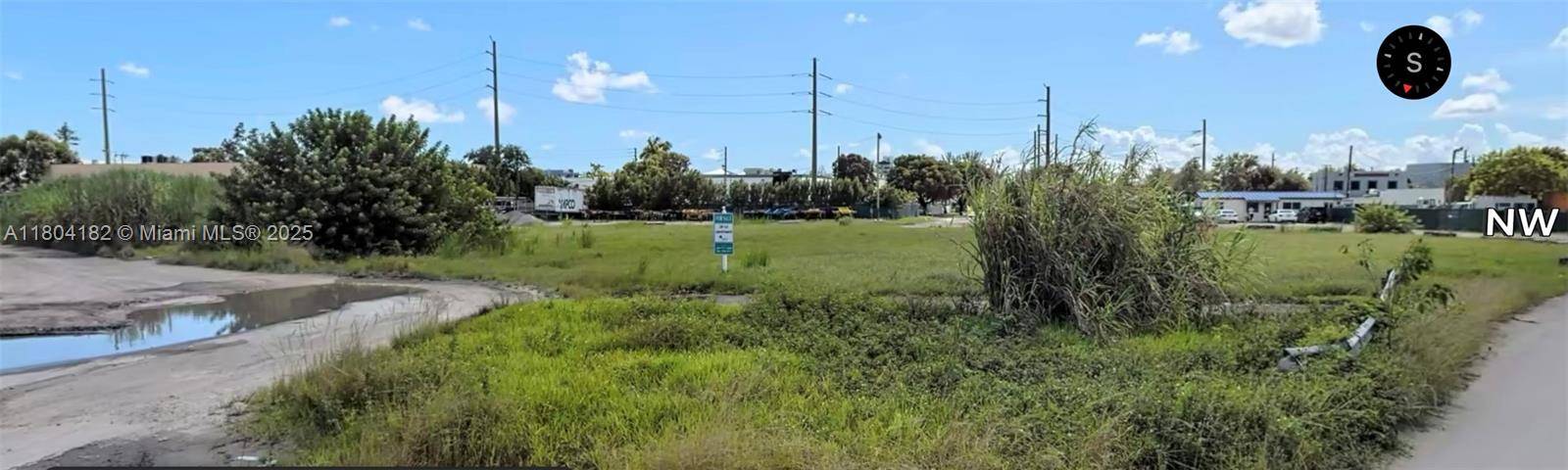 PRIME DEVELOPMENT OPPORTUNITY IN SWEETWATER DORAL Seize this rare chance to acquire a circular lot in the thriving Sweetwater Doral corridor, perfectly suited for office or retail development.