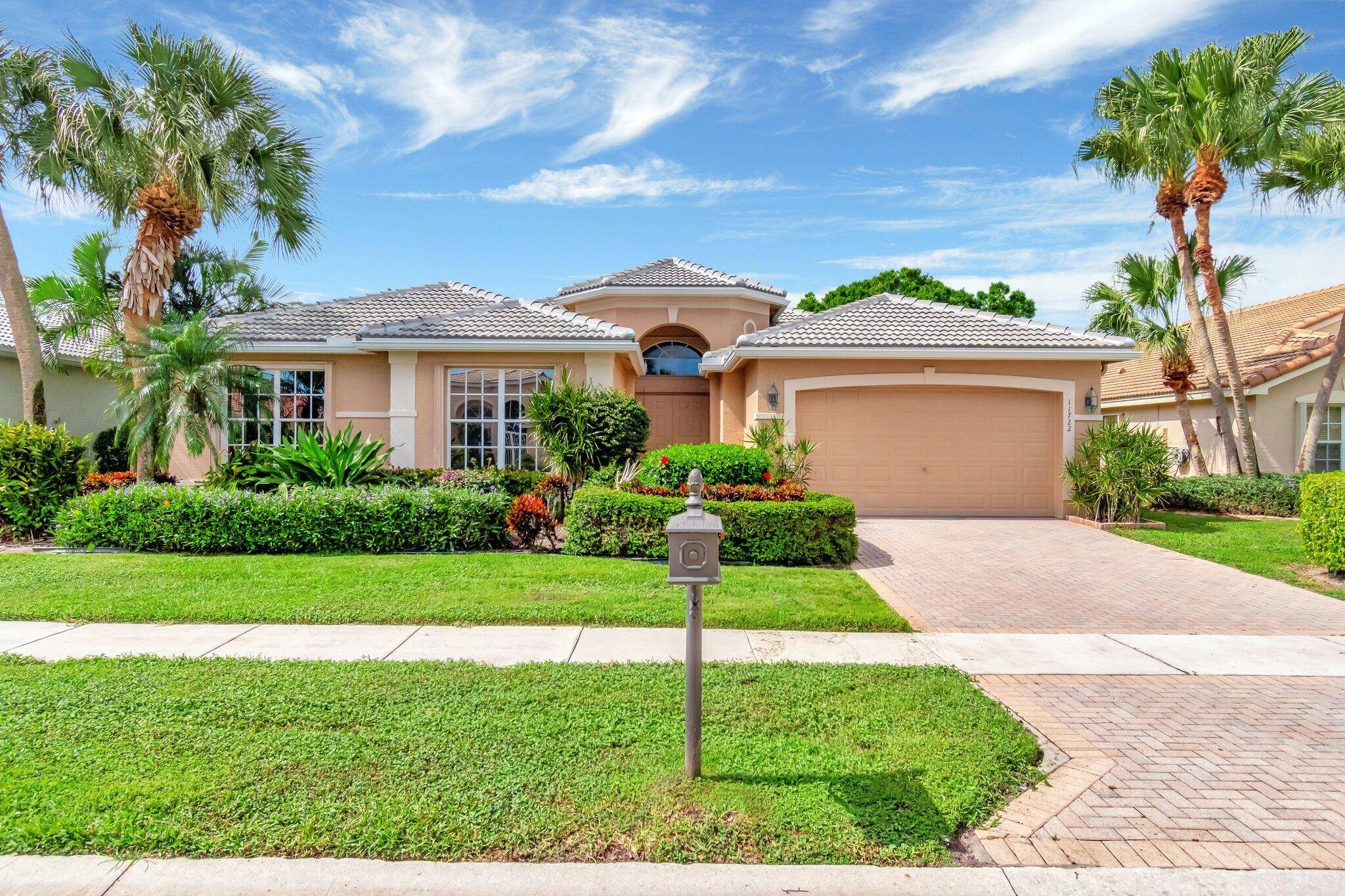 Welcome to 11722 Caracas Boulevard, a meticulously maintained residence in the sought after Valencia Lakes, a premier active adult community.