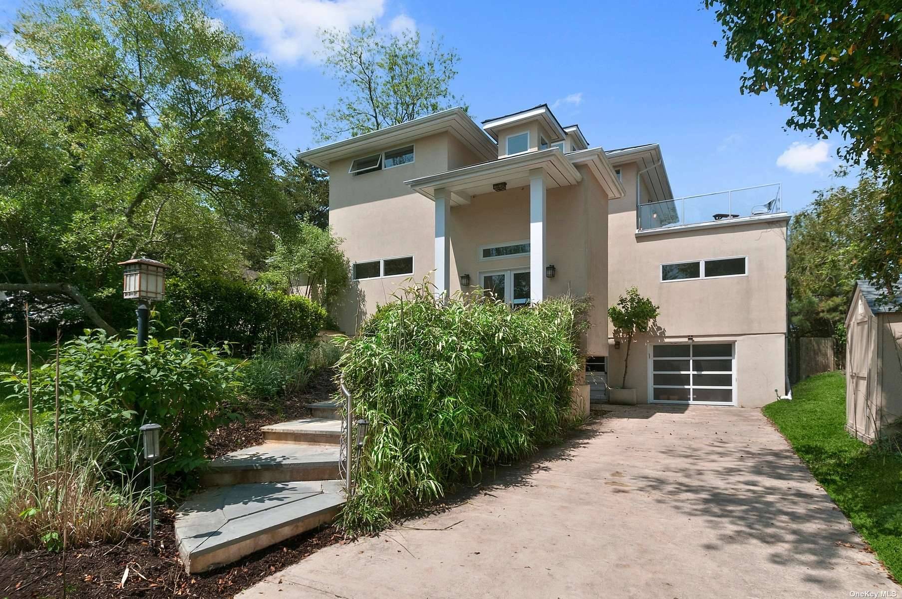 Sag Harbor Home w Pool amp ; Forever Water Views Moments from Long Beach in the prestigious Bay Point community and surrounded by water, this modern home offers exceptional elevated ...