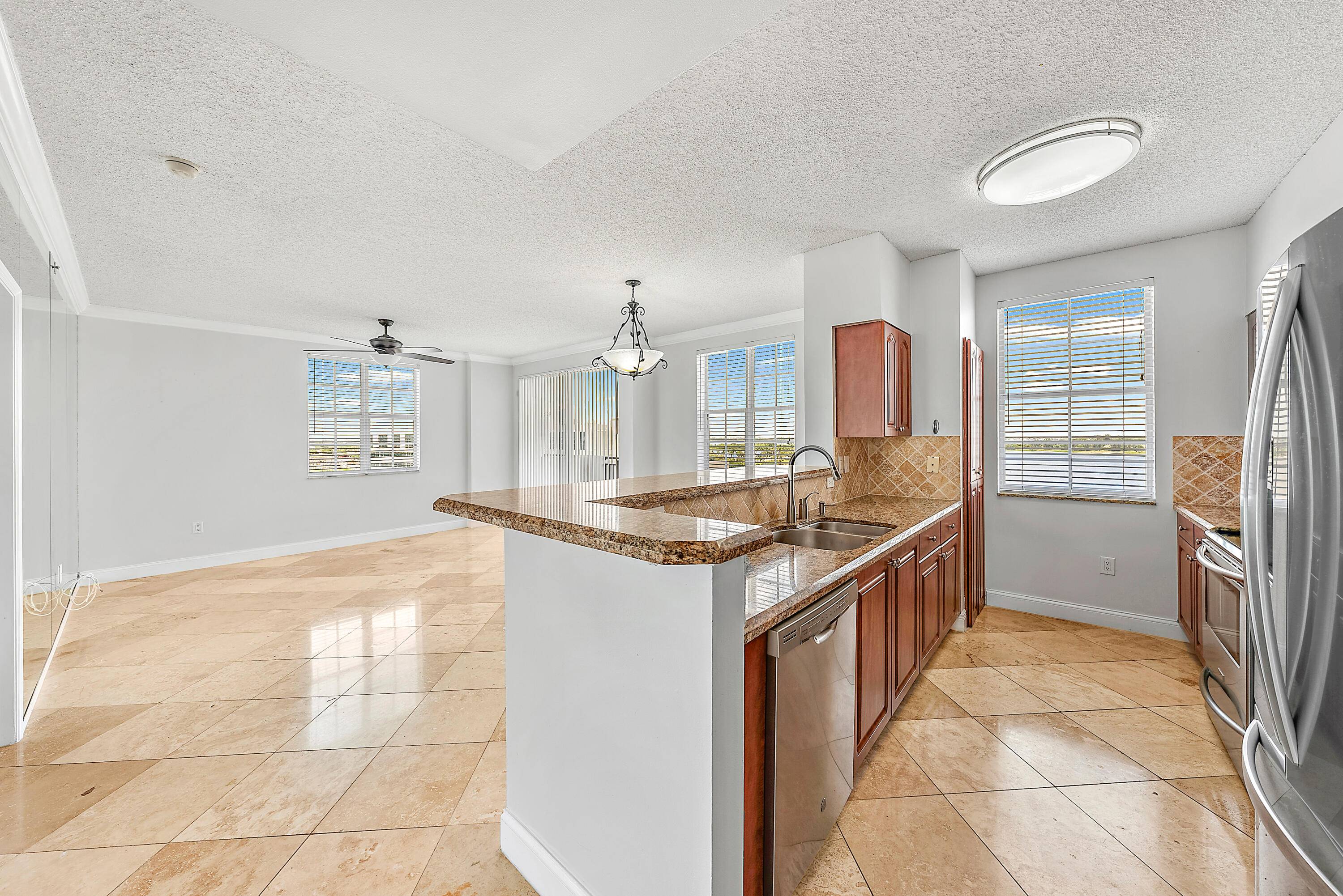 Imagine yourself living in this luxurious high rise condominium conveniently located in booming downtown West Palm Beach.