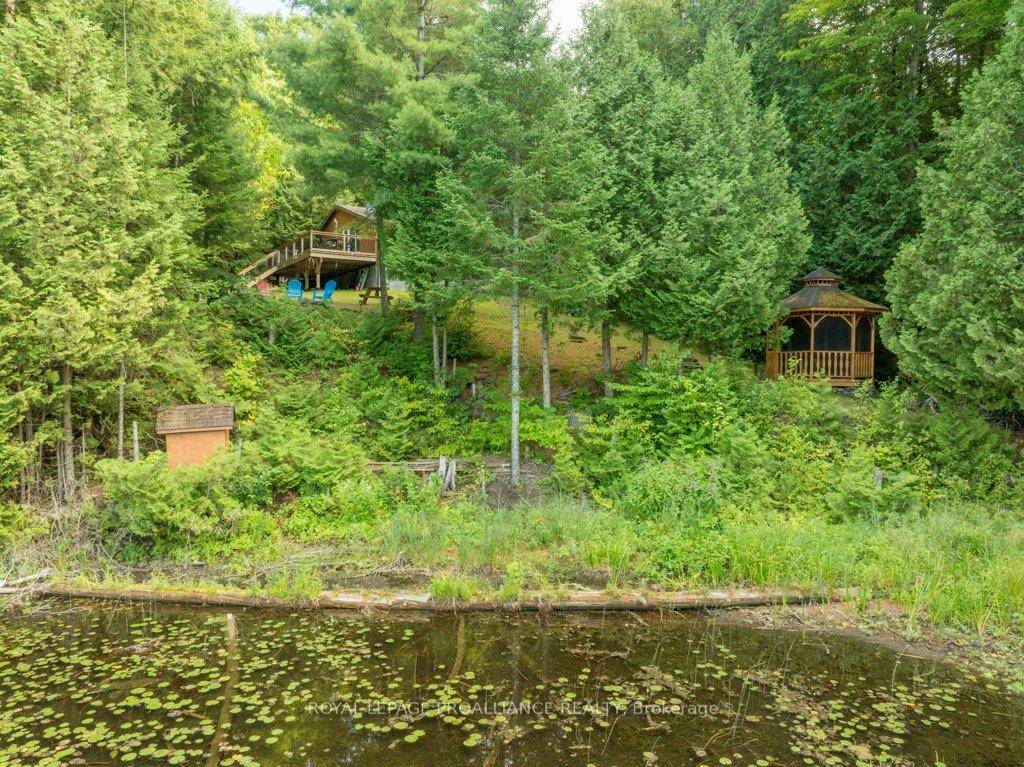 Discover your dream 4 season recreational property on the stunning shores of Little Mississagagon Lake, where natures beauty meets modern comfort in this charming 1, 763 sqft cottage.