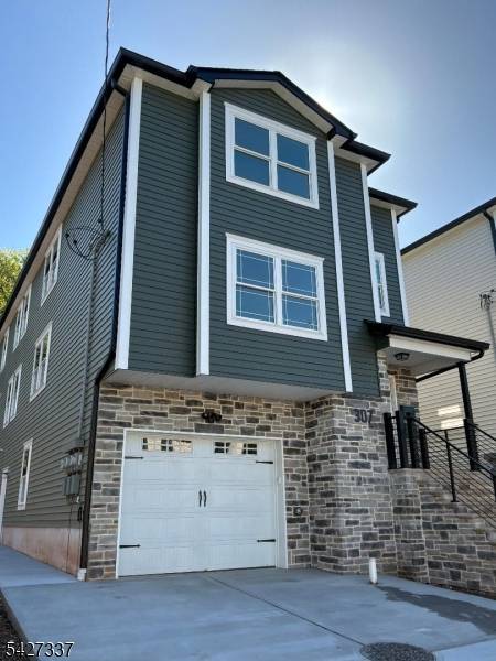 Elmora section under construction new 2 apartments with garage recreation room full bath connection to first floor apartment with 3 bedrooms living room dining room, 2 full bathrooms approx.