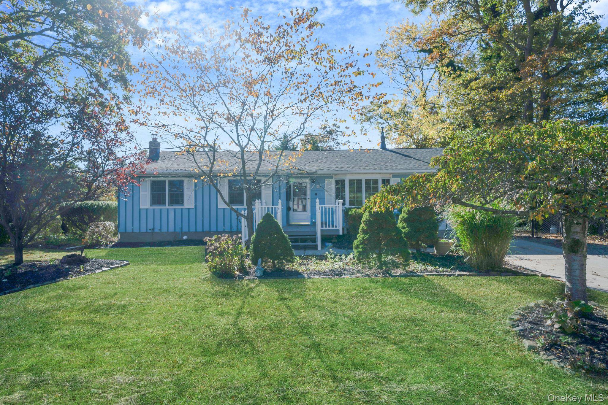 Charming Holbrook Ranch in the Sachem School District.