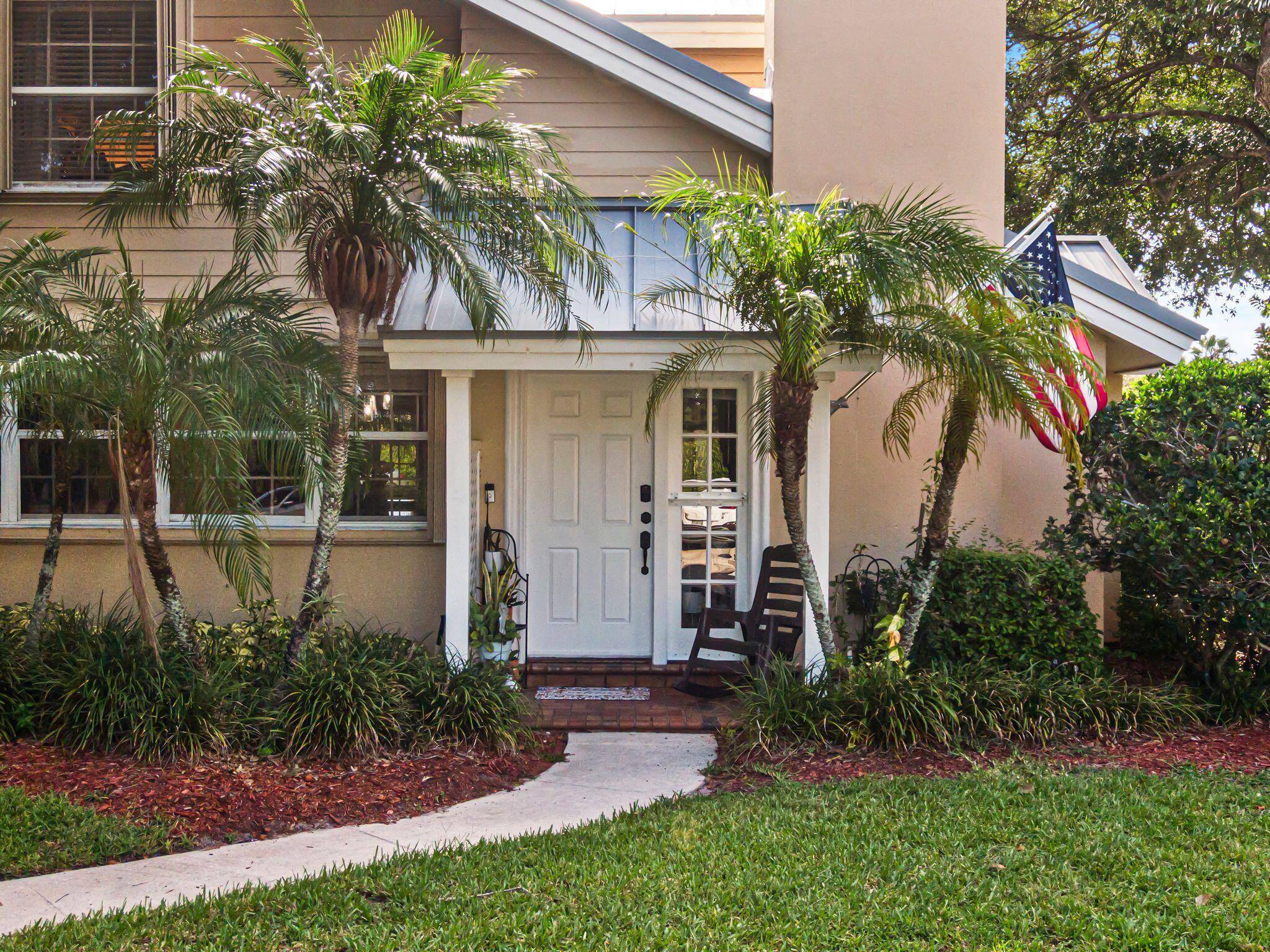 Impeccably updated 3 bedroom, 2 bath townhouse featuring a durable metal roof 2019, new AC unit 2020, and water heater 2024.