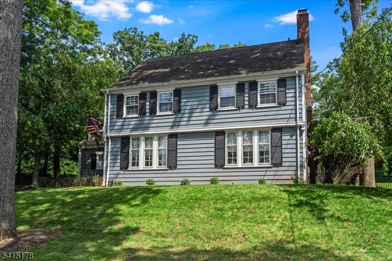 Timeless Colonial Charm with Exceptional Outdoor Living.