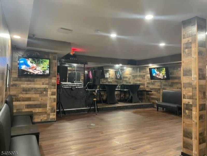 Mixed use property located on a high traffic corner along Summer Street, surrounded by established businesses.