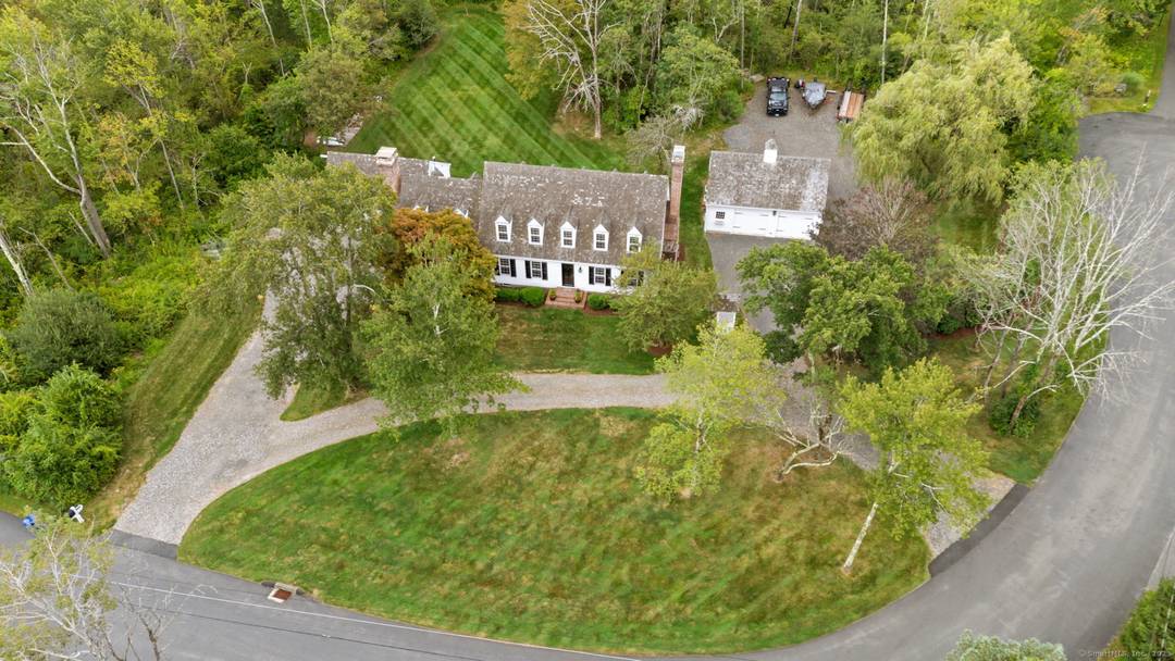 Welcome to this striking Cape Colonial nestled on a picture perfect, dead level parcel in one of Sherman's most desirable locations.