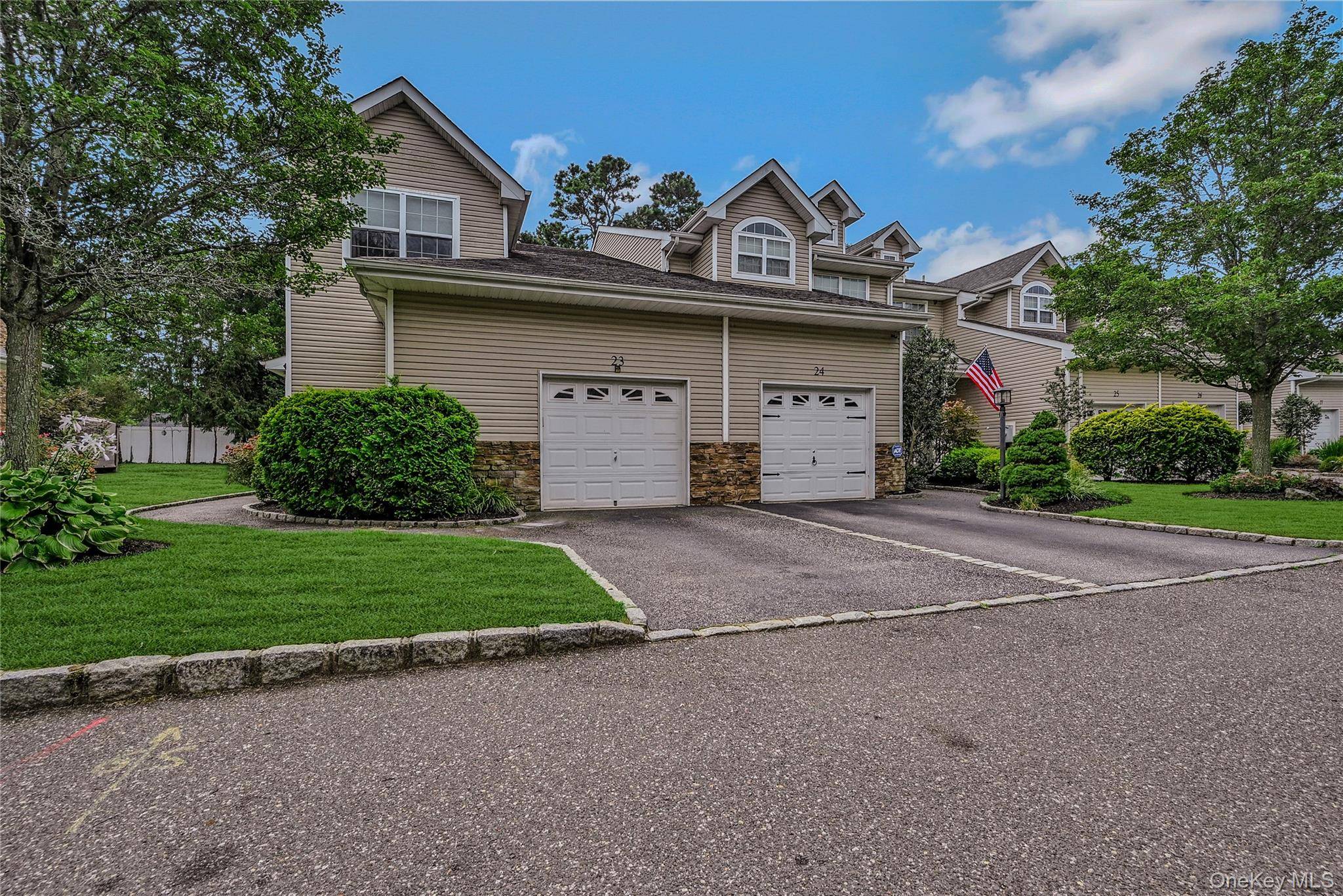 Nestled in the heart of Patchogue Village, this charming condo offers the perfect blend of comfort and convenience.