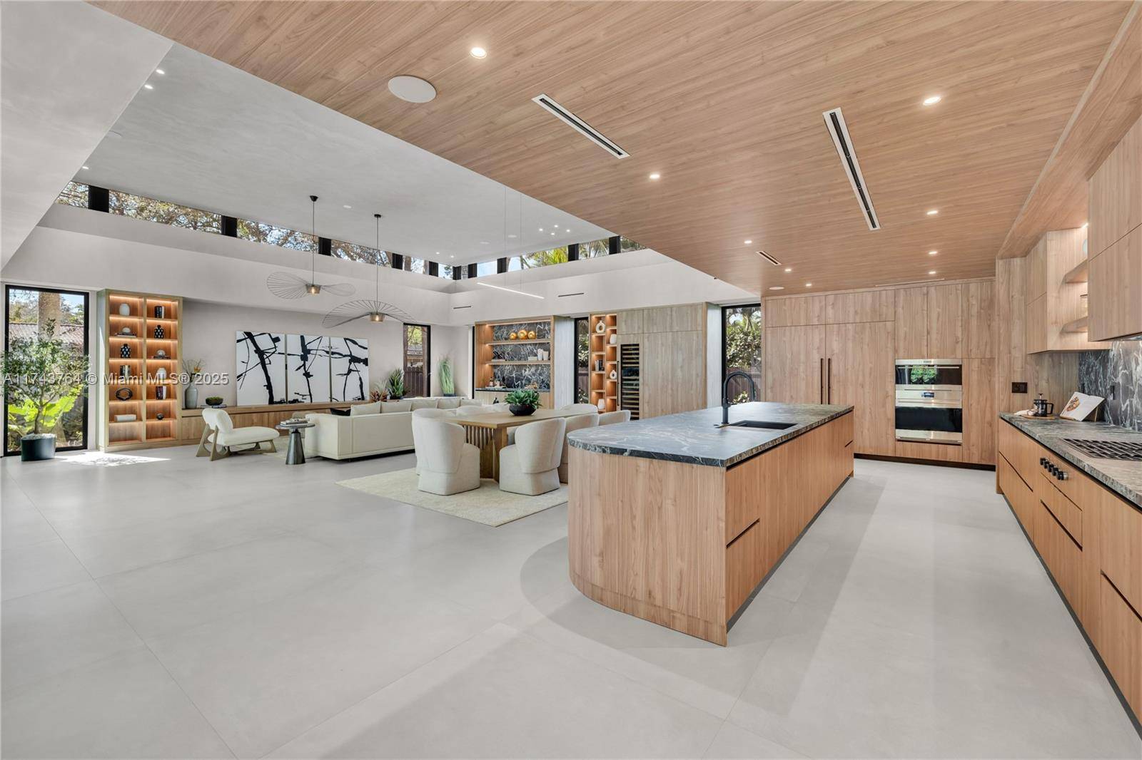 Tucked away on a lush, secluded cul de sac in Biscayne Park, this brand new 2025 luxury estate is a timeless masterpiece, seamlessly blending modern design with natural beauty and ...